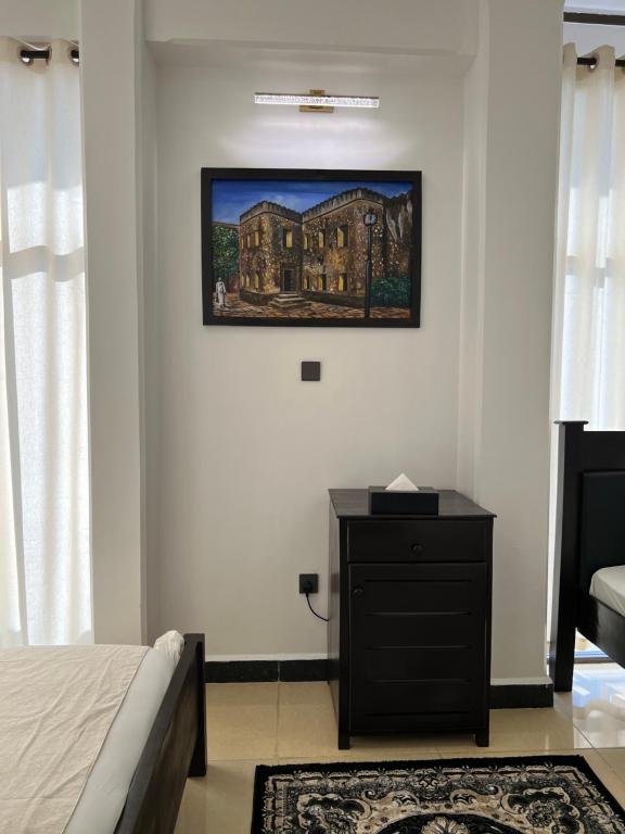 TV a/nebo společenská místnost v ubytování Dreams Hotel Zanzibar