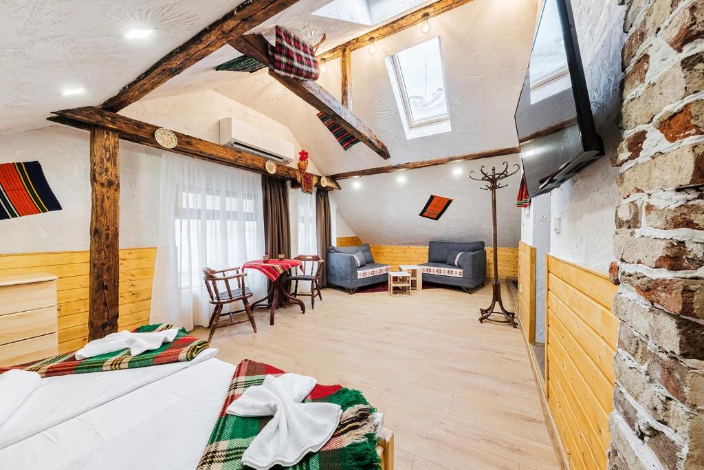 A television and/or entertainment centre at Sofia Folklore Life Apartment