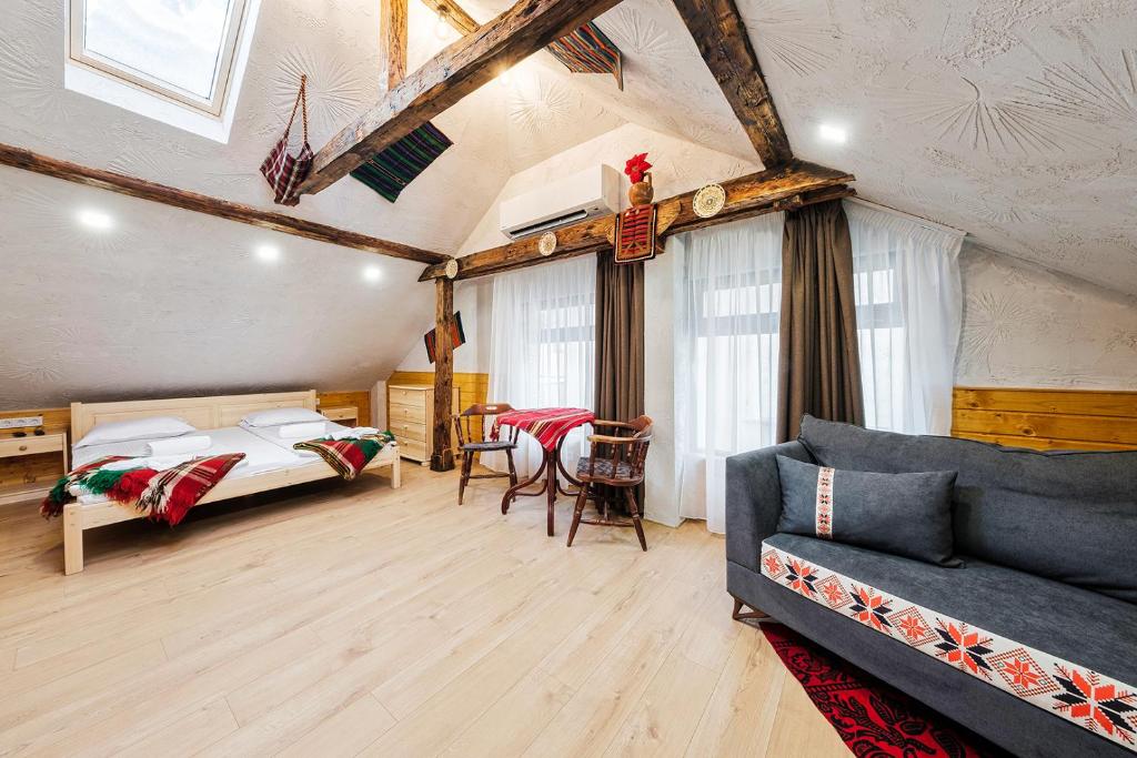 A bed or beds in a room at Sofia Folklore Life Apartment