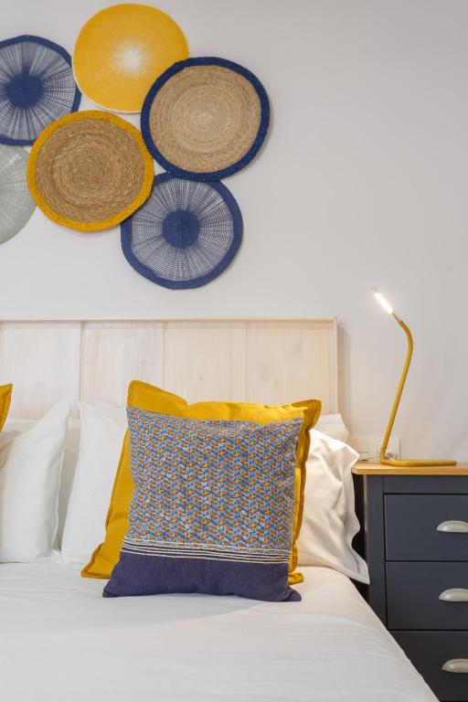 Posteľ alebo postele v izbe v ubytovaní Apartamento El NOBLE by Cadiz4Rentals