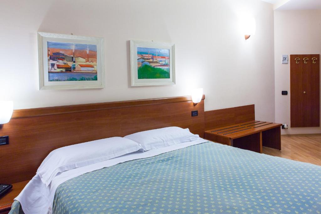 Posteľ alebo postele v izbe v ubytovaní Hotel San Marco