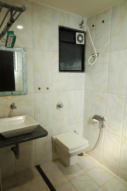 Koupelna v ubytování Hotel Sai Bansi