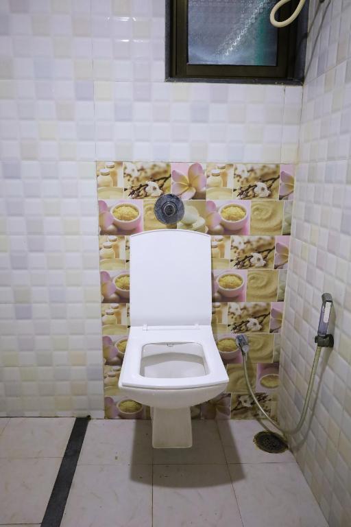 Koupelna v ubytování Hotel Sai Bansi