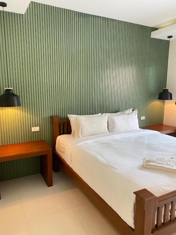 Postel nebo postele na pokoji v ubytování Chunut House Resort