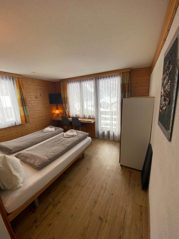 Postel nebo postele na pokoji v ubytování Hotel Garni Jägerhof
