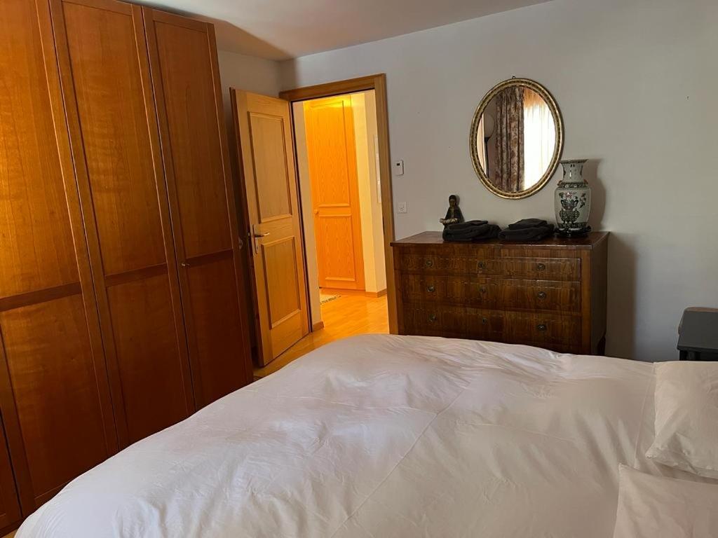 Postel nebo postele na pokoji v ubytování Spacious apartment up to 6 people in Flims