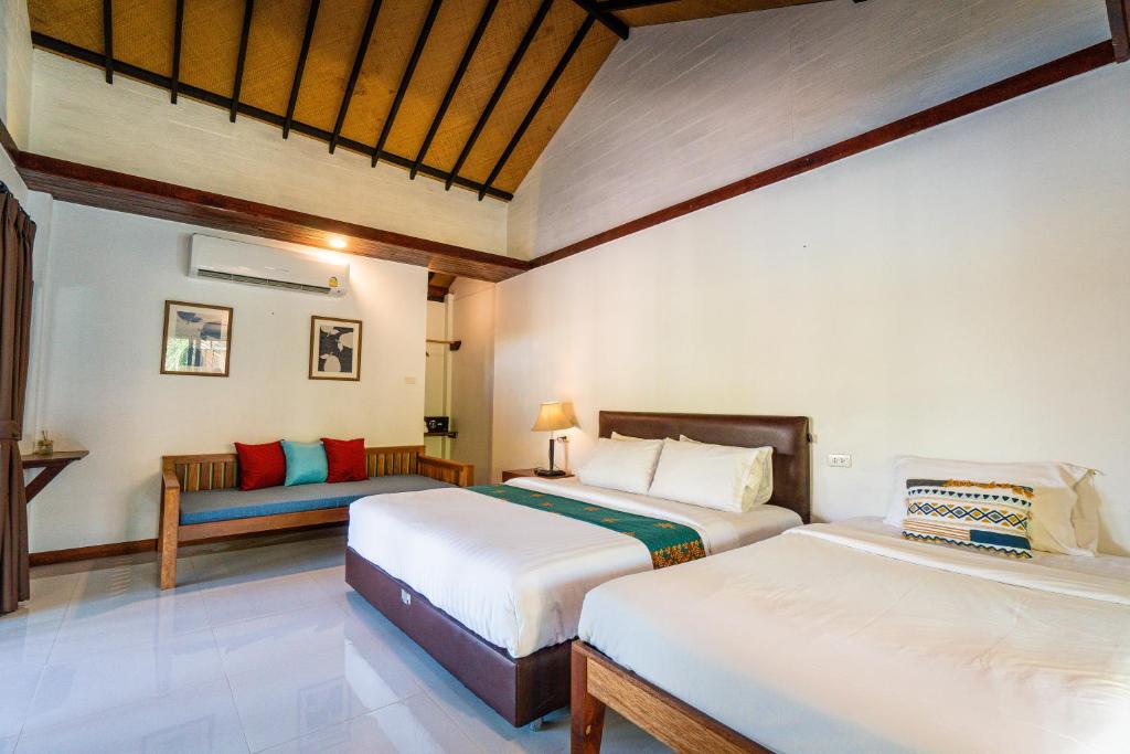 Postel nebo postele na pokoji v ubytování Chunut House Resort