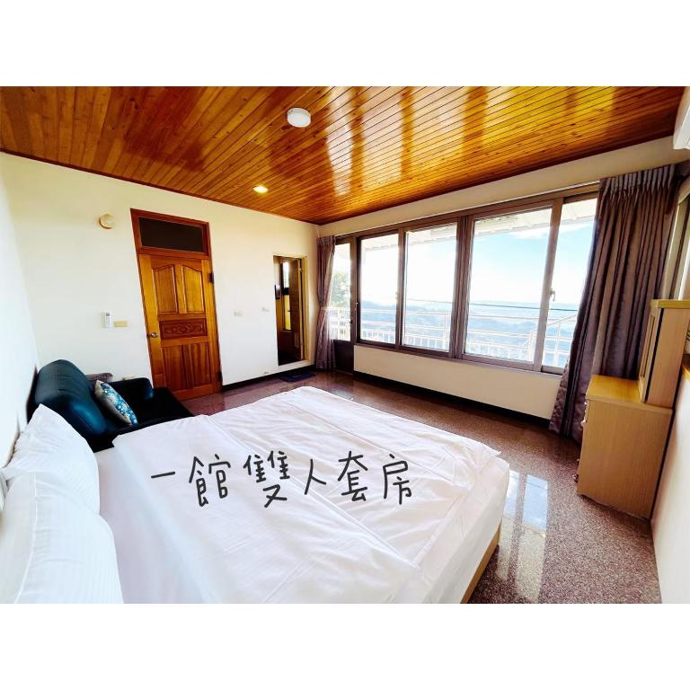 Postel nebo postele na pokoji v ubytování 星森林包棟住宿-台中東勢-山區景觀