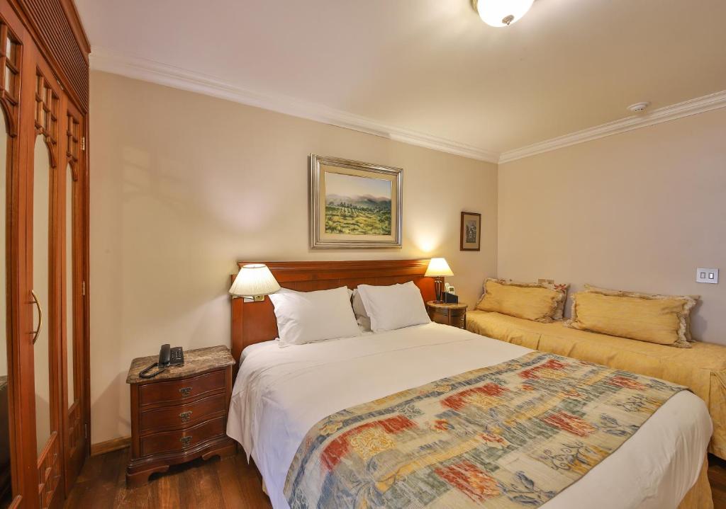 Le Suisse Elegance Hotel - Верхняя тройная комната