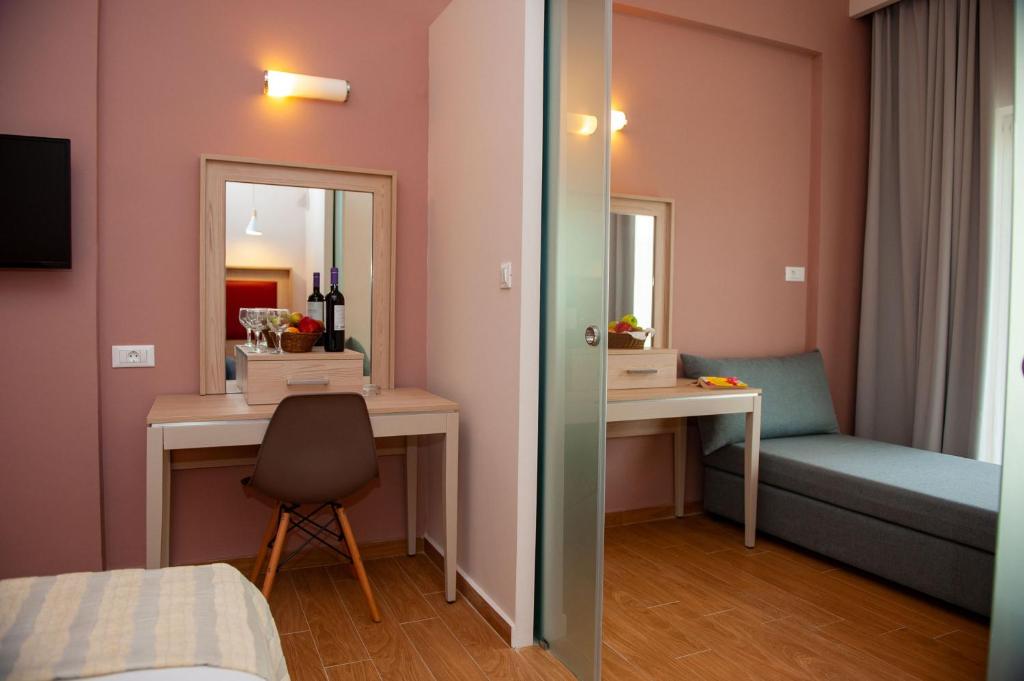 Postel nebo postele na pokoji v ubytování Filerimos Village Hotel