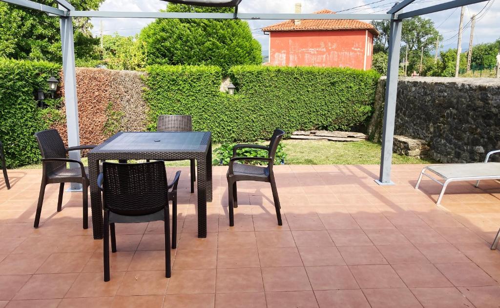 Jardín al aire libre en Posada La Casona de Los Güelitos