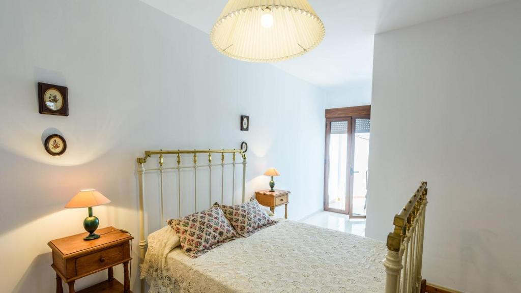 Łóżko lub łóżka w pokoju w obiekcie Casa Mari Frigiliana by Ruralidays