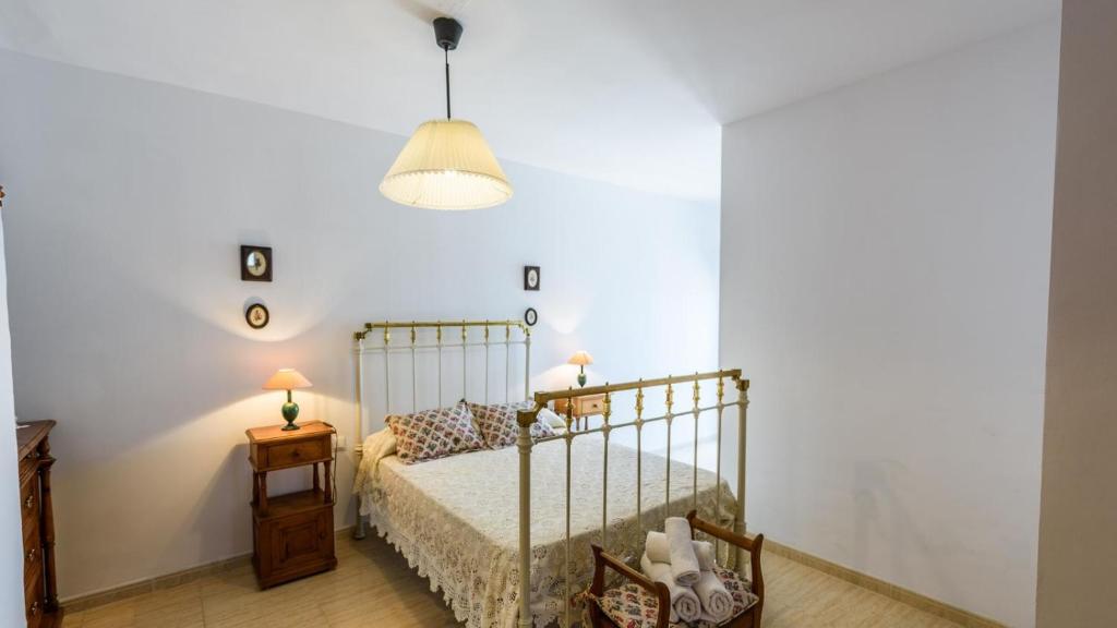 Łóżko lub łóżka w pokoju w obiekcie Casa Mari Frigiliana by Ruralidays