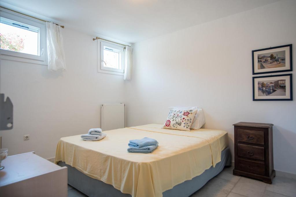 Posteľ alebo postele v izbe v ubytovaní Eternity Seafront Villa Awakening Senses
