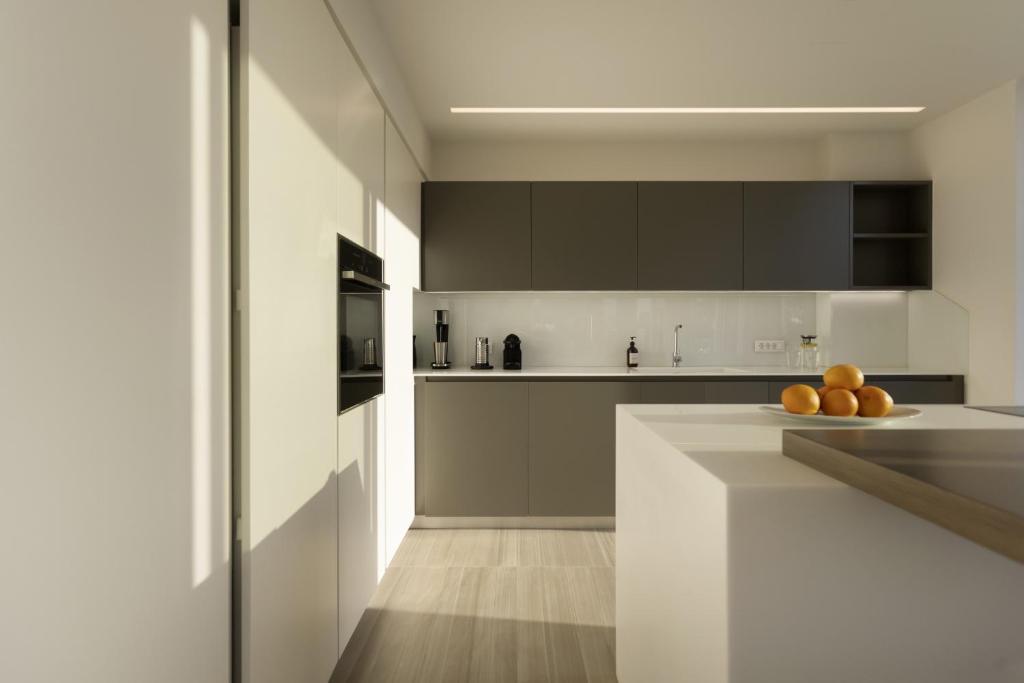 Kuchyňa alebo kuchynka v ubytovaní Über Lux 2 BR New Penthouse with Acropolis View