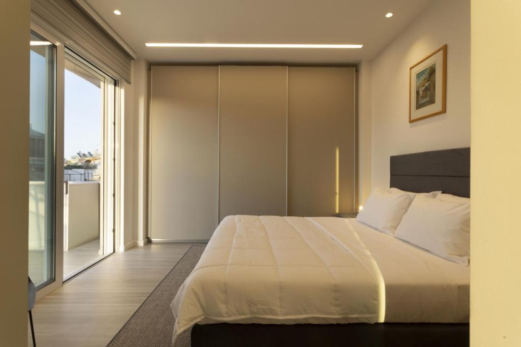 Posteľ alebo postele v izbe v ubytovaní Über Lux 2 BR New Penthouse with Acropolis View
