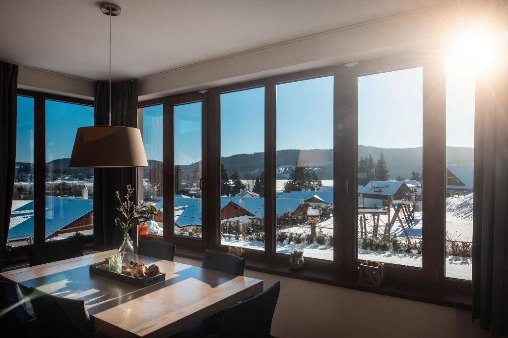 Bazén v ubytování Residence Lipno nebo v jeho okolí
