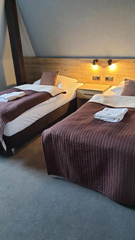 Postel nebo postele na pokoji v ubytování Villa Jaśmin