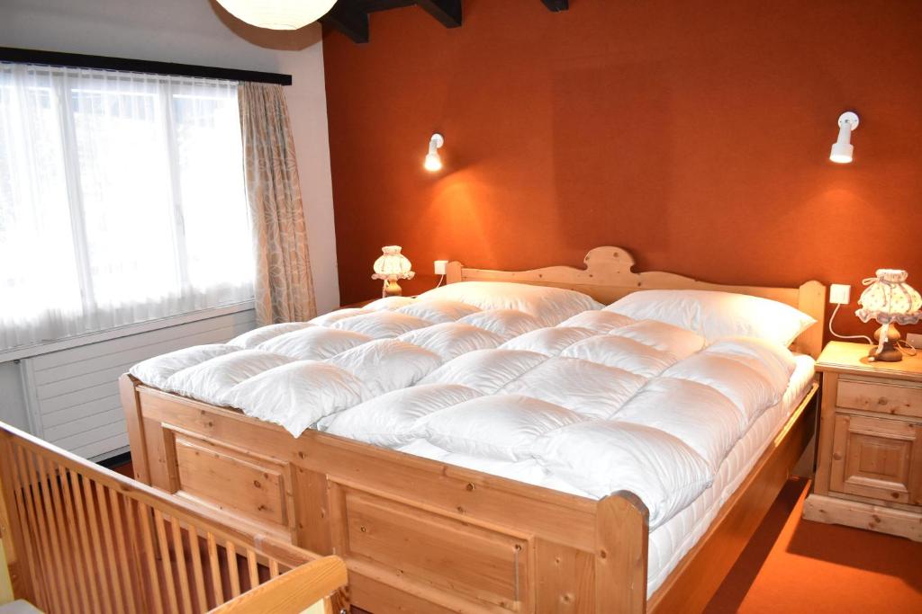 Postel nebo postele na pokoji v ubytování Arp (470 Bä) OG