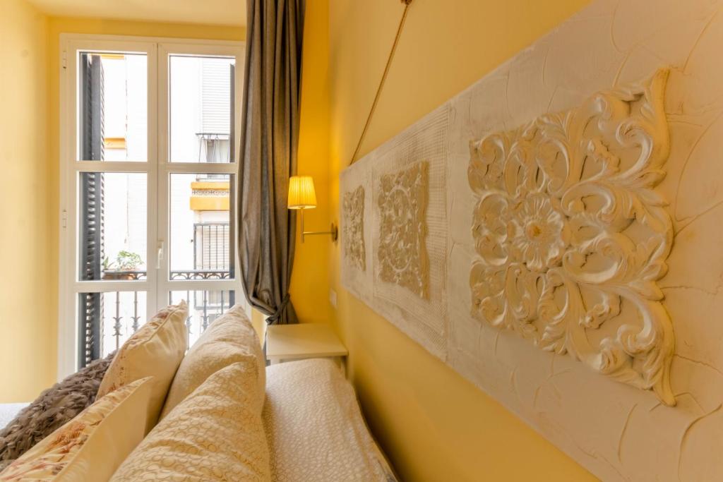 A seating area at Apartamento DUX VERAGUA Centro Sevilla