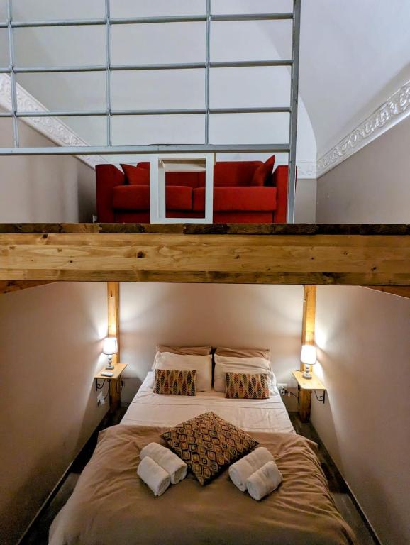 Łóżko lub łóżka w pokoju w obiekcie B&B Benincasa