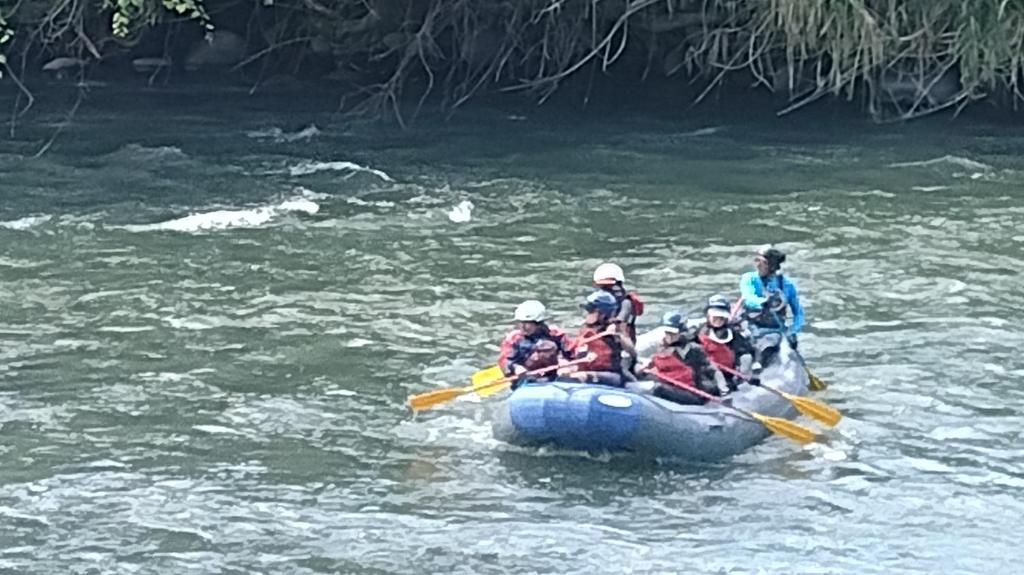 a group of people in a raft on a river at Sendero extremo in Jalcomulco