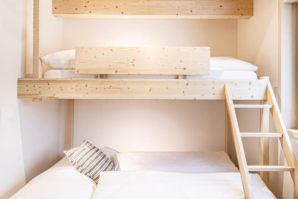 Postel nebo postele na pokoji v ubytování Haus im WALDner