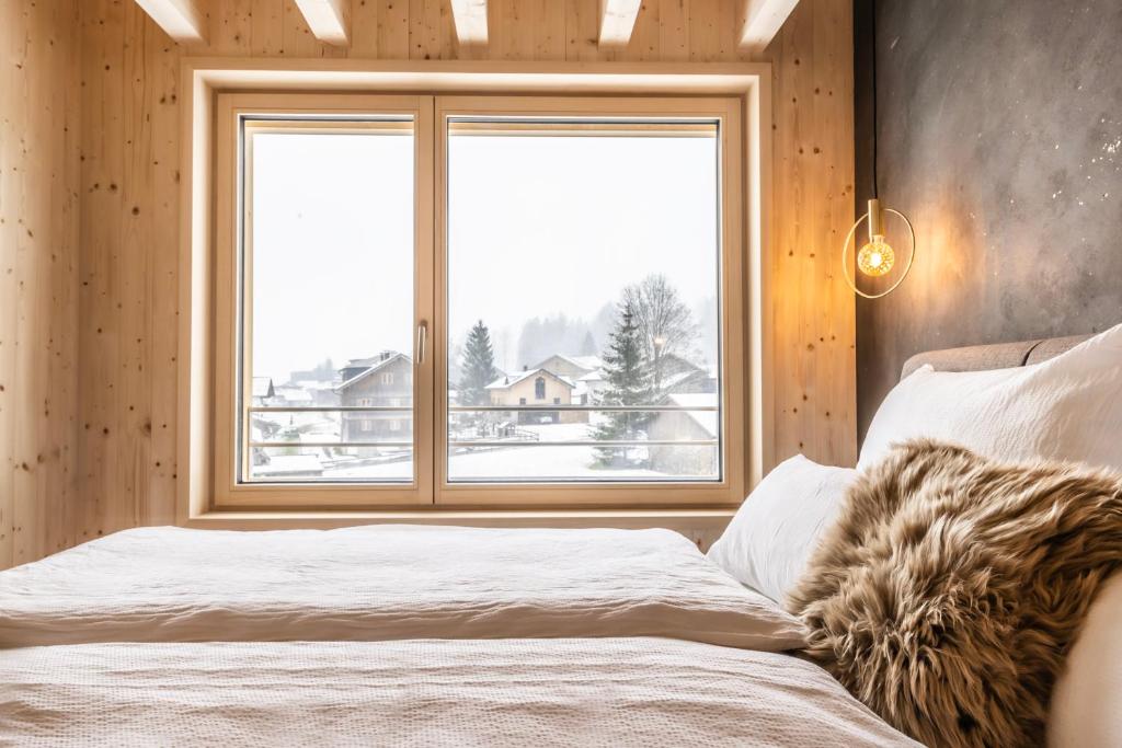 Postel nebo postele na pokoji v ubytování Haus im WALDner