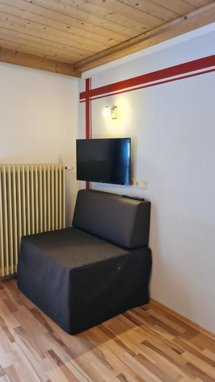 TV a/nebo společenská místnost v ubytování Apart Pfister