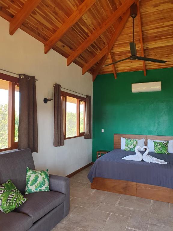 Postel nebo postele na pokoji v ubytování Palmetto Lodge