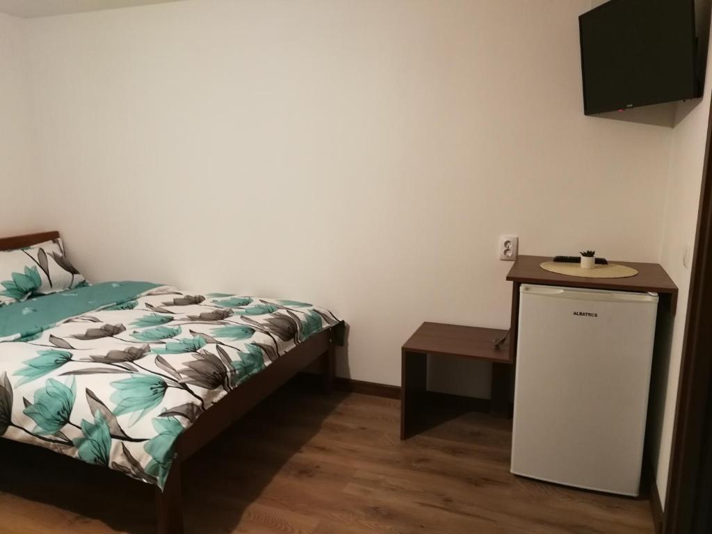 Postel nebo postele na pokoji v ubytování Căsuțe Zăvoi Bulz