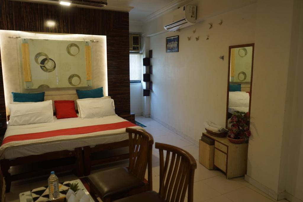 Letto o letti in una camera di HOTEL KRISHNA