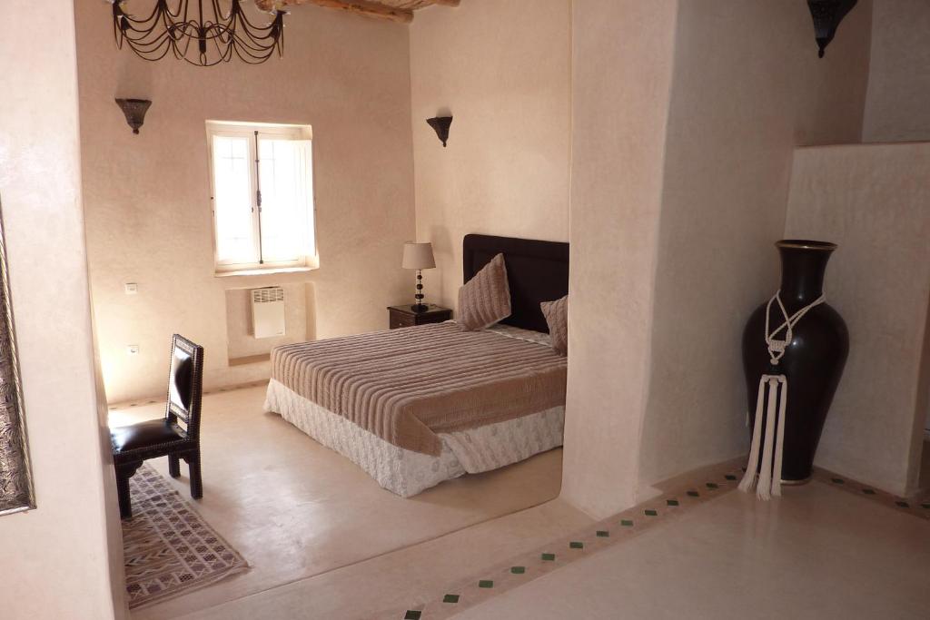 Postel nebo postele na pokoji v ubytování Palais Villa Talaa Resort