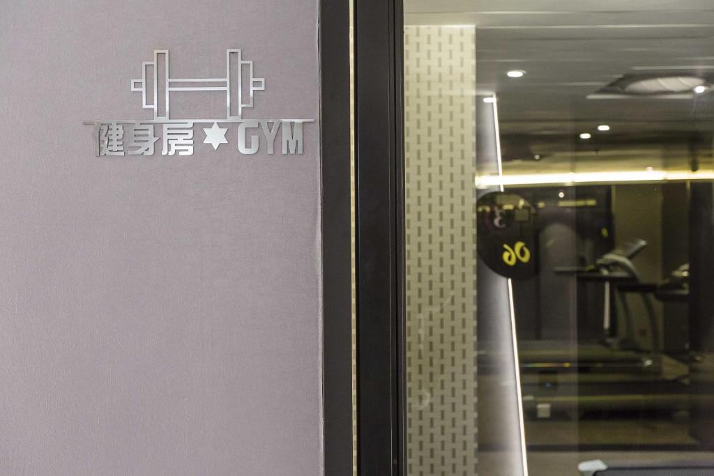 a close up of a door with a sign on it at The Cloud Hotel in Taichung