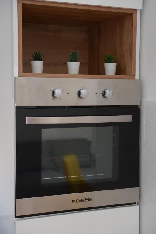 Kuchyň nebo kuchyňský kout v ubytování MD apartman Vranje FREE PARKING