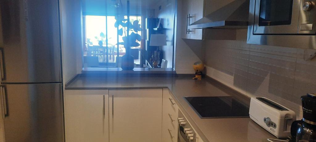 Kuchyňa alebo kuchynka v ubytovaní Appartement de standing avec vue mer et golf
