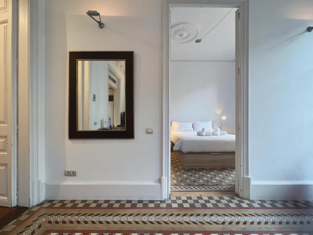 A bed or beds in a room at Stay Unique Apartments Bruc