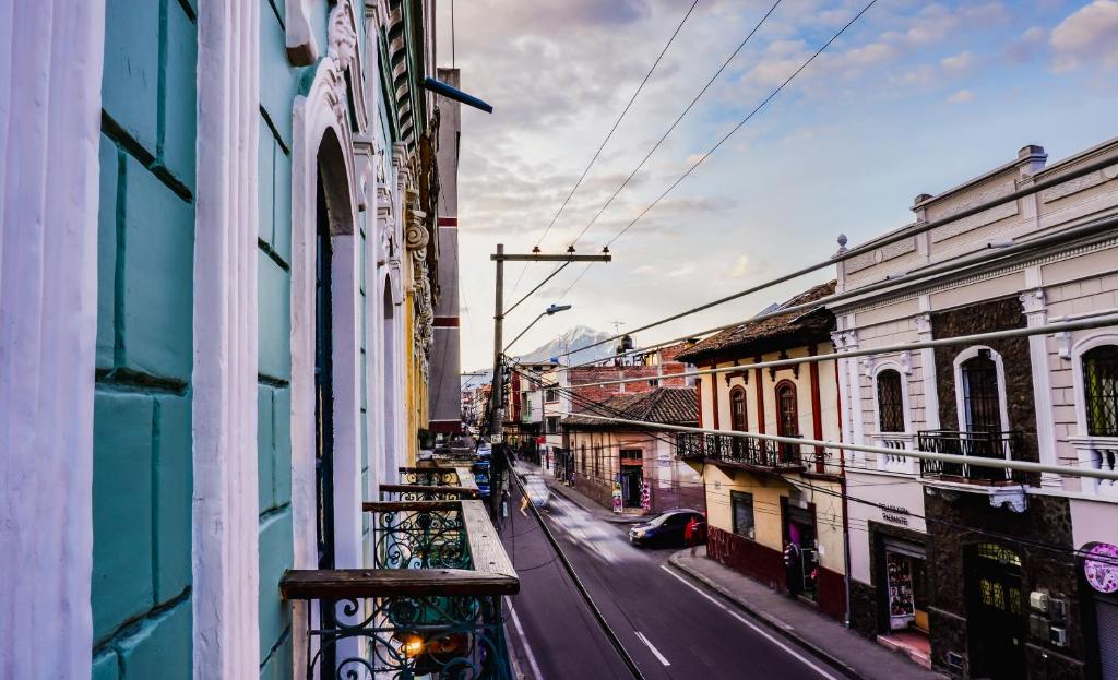 a view of a street from a balcony of a building at Casa 1881 in Riobamba