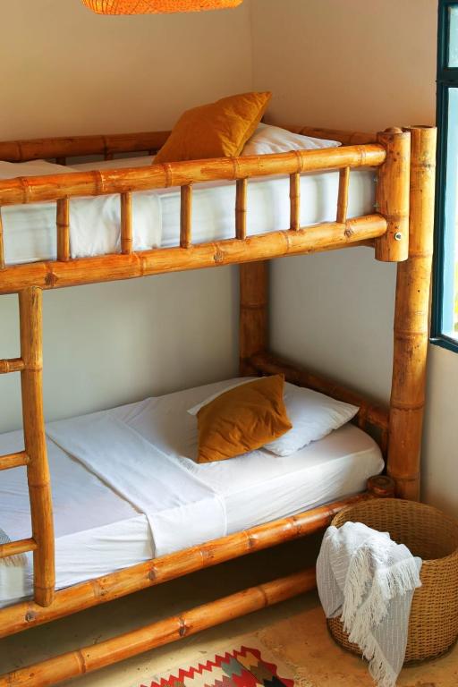 Postel nebo postele na pokoji v ubytování Casa Mostaza-Ecolodge
