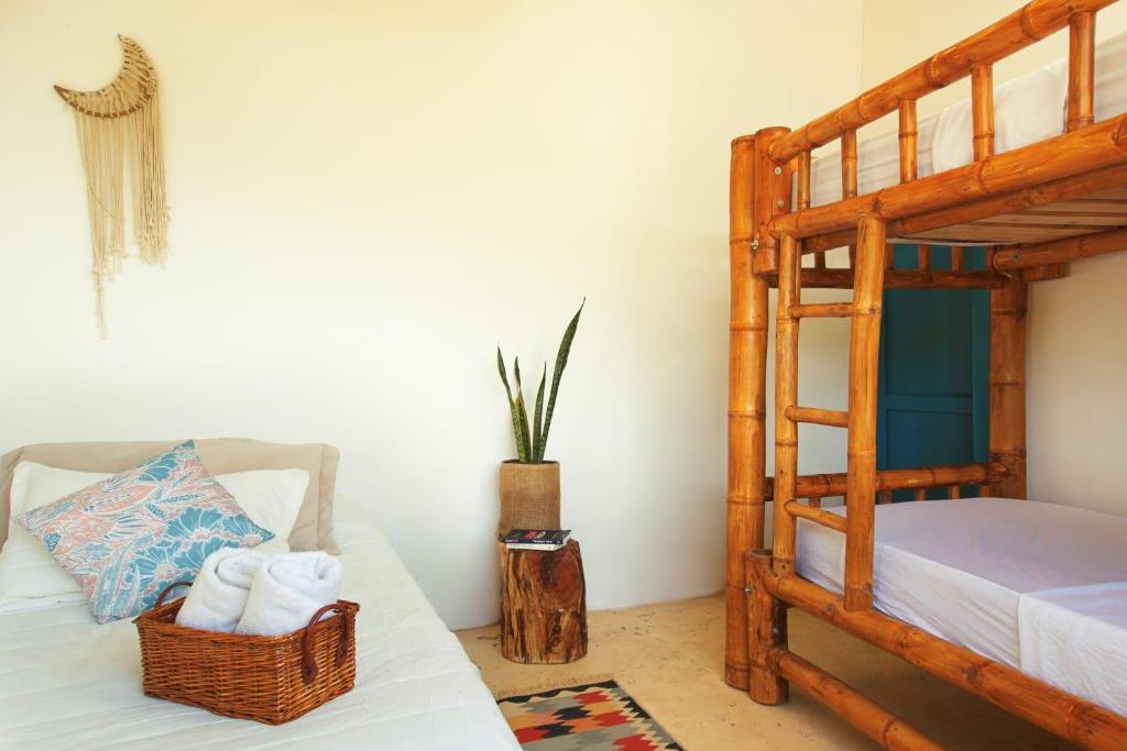 Postel nebo postele na pokoji v ubytování Casa Mostaza-Ecolodge