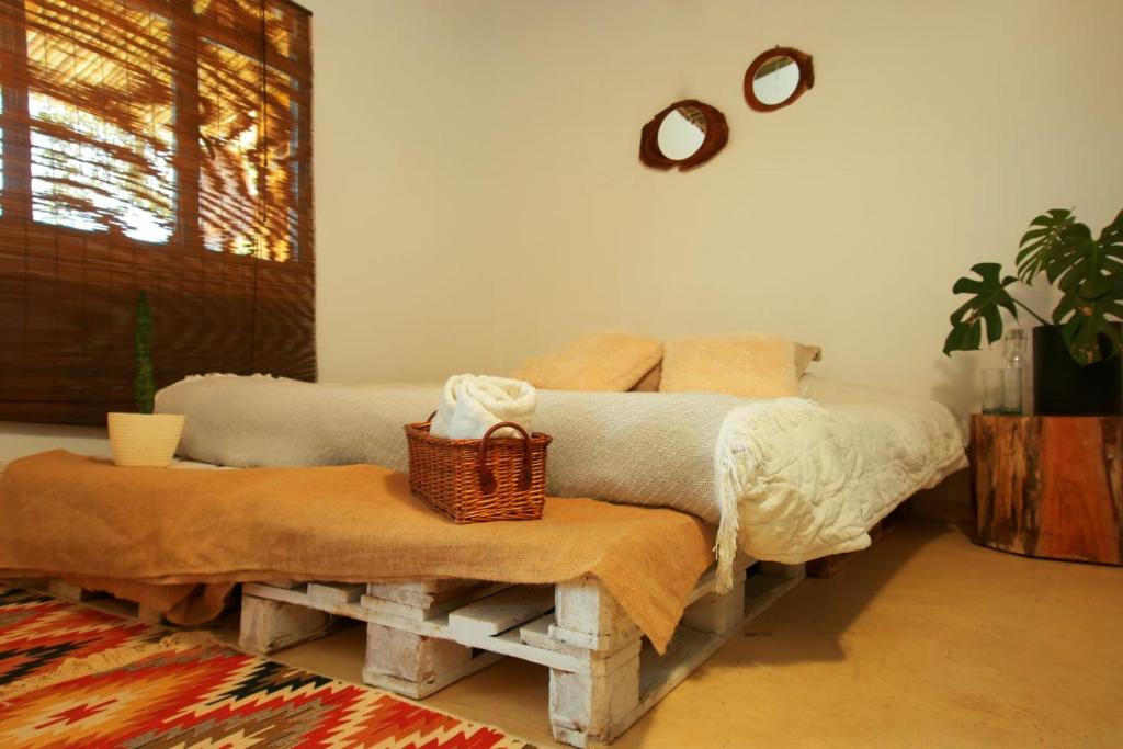 Postel nebo postele na pokoji v ubytování Casa Mostaza-Ecolodge