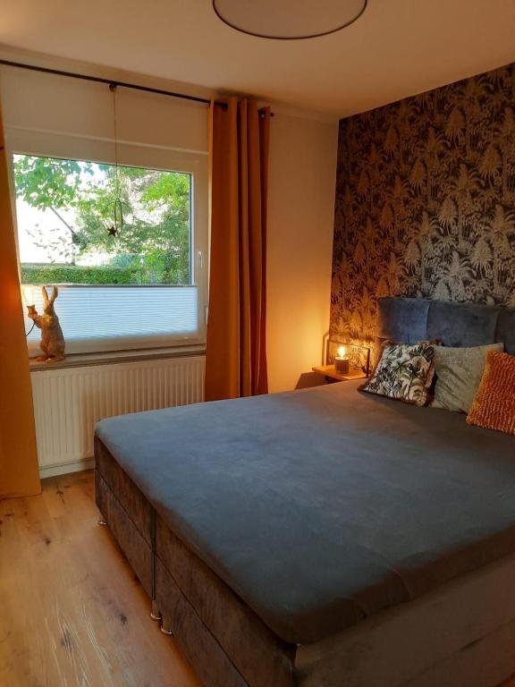 Postel nebo postele na pokoji v ubytování Ferienwohnung Hansens