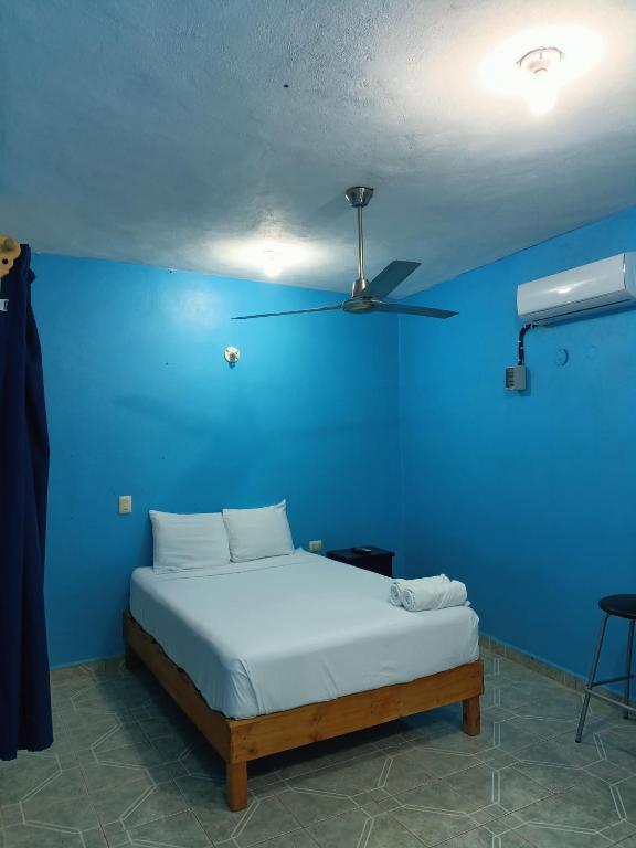 Postel nebo postele na pokoji v ubytování Casa Bonzay