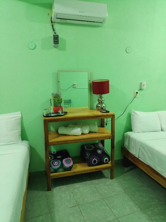 Postel nebo postele na pokoji v ubytování Casa Bonzay