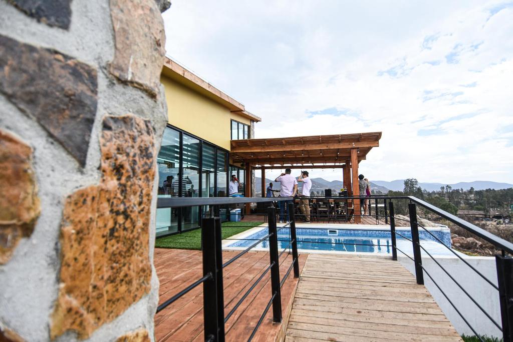 a view from the deck of a house with a pool at Casa Brisa Chivato in Chivato