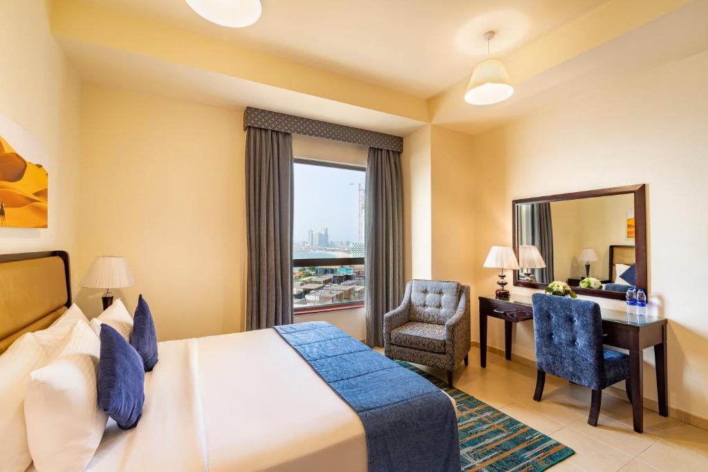 Postel nebo postele na pokoji v ubytování Roda Amwaj Suites Jumeirah Beach Residence