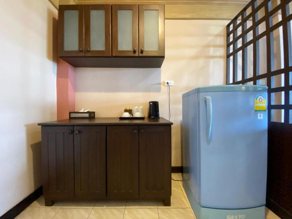 Kuchyň nebo kuchyňský kout v ubytování Baan Kongdee Sunset Resort Kata