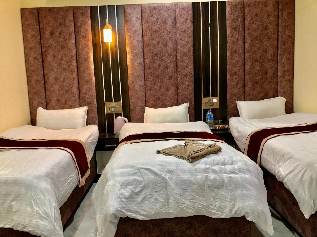 Postel nebo postele na pokoji v ubytování Hotel Hot Pot, Dhangadhi