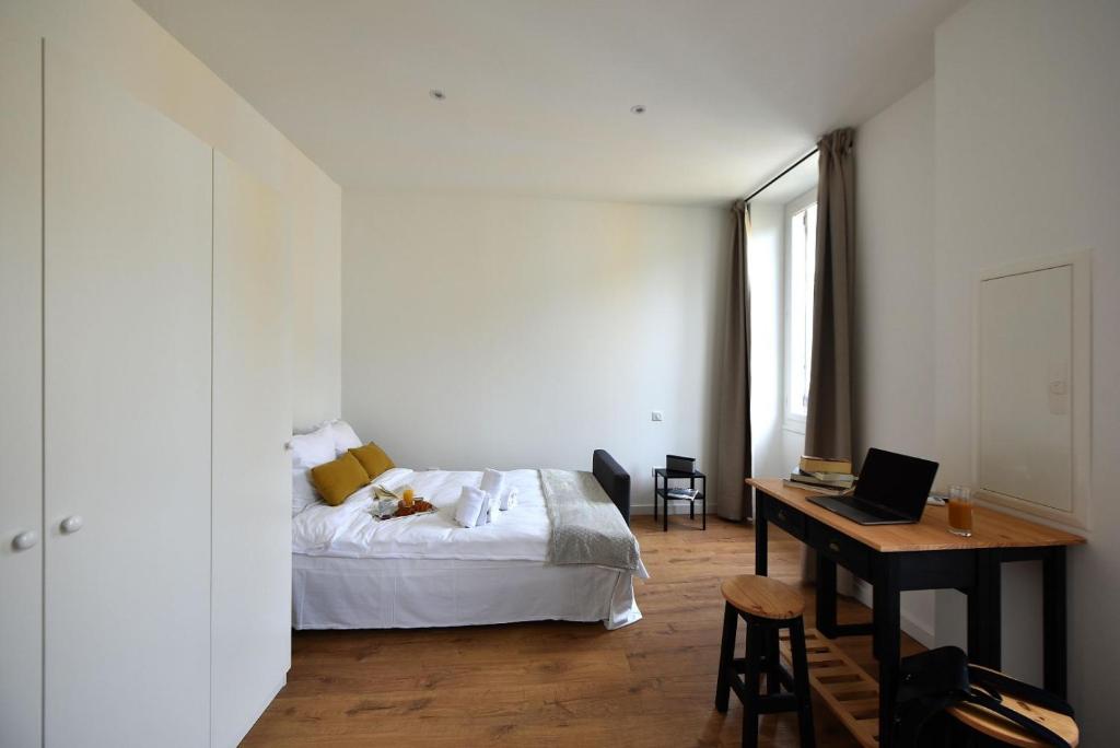 Posteľ alebo postele v izbe v ubytovaní Hôtel Continental