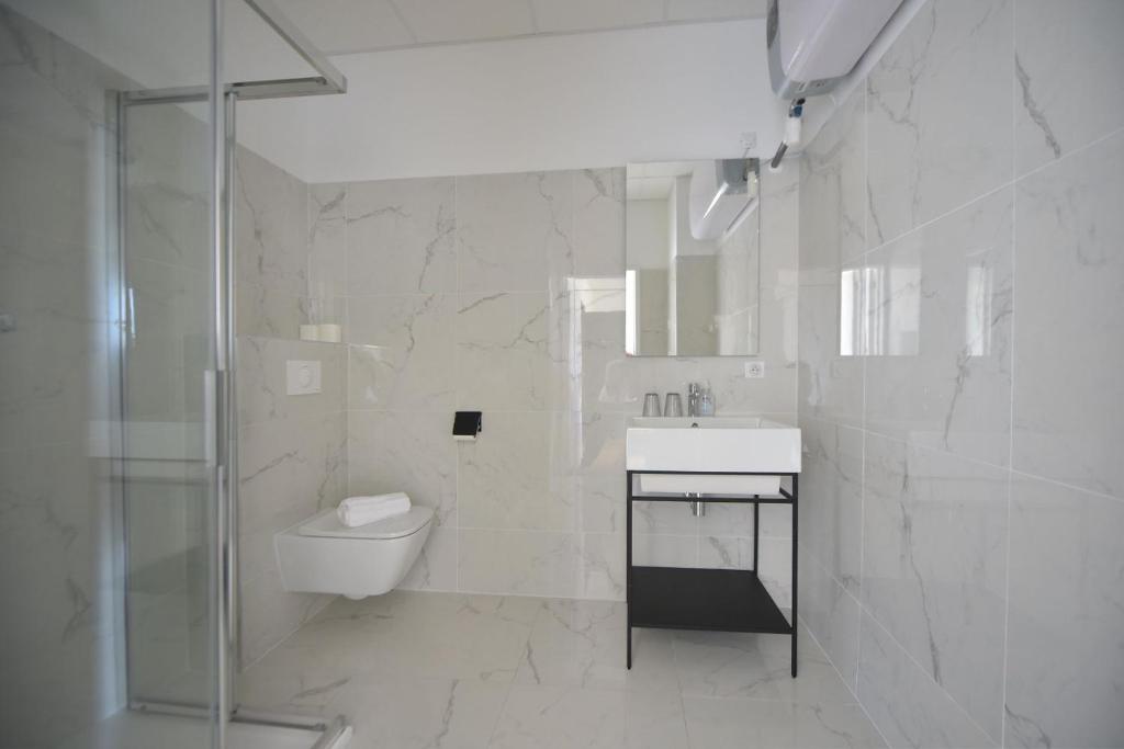 Kúpeľňa v ubytovaní Hôtel Continental